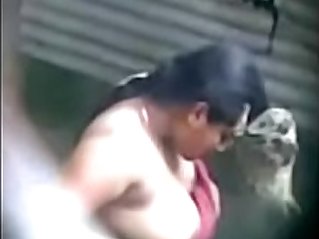 Secretly recorded MMS of a village aunty taking bath captured by a voyeur Play Indian Porn